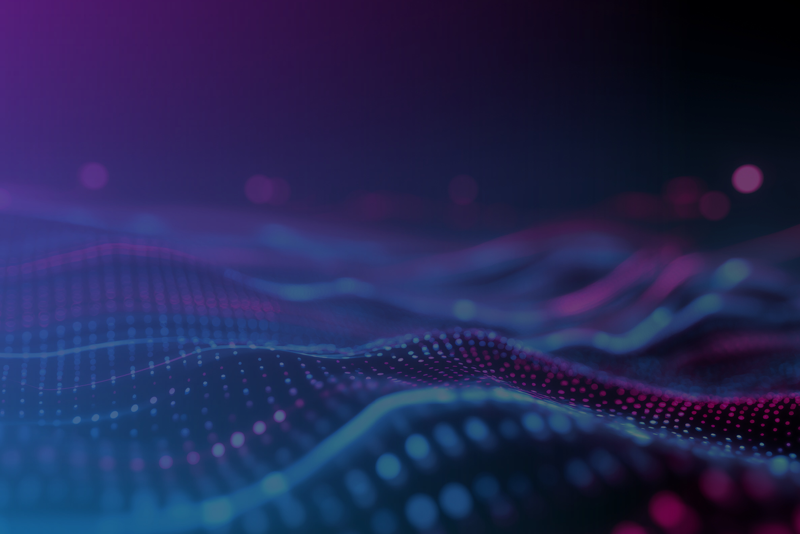 Abstract digital wave pattern with blue and purple glowing dots on a dark background.